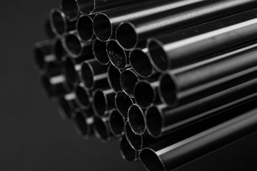 Bundle of CPVC pipes in monochrome gradient