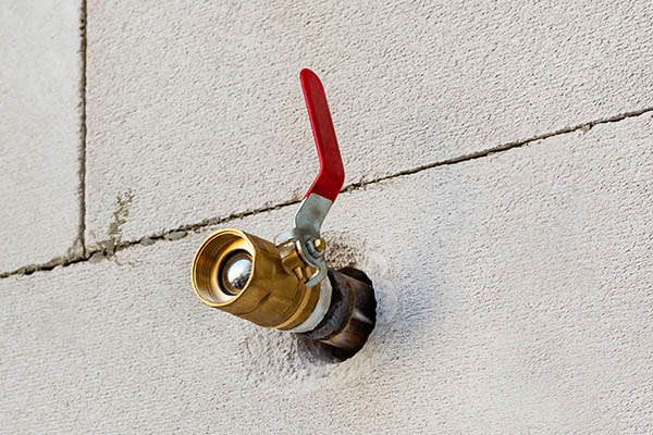 Installed bronze valve in wall